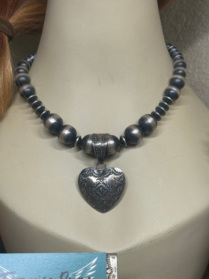Vincent J. Platero Stamped Heart Pendant
